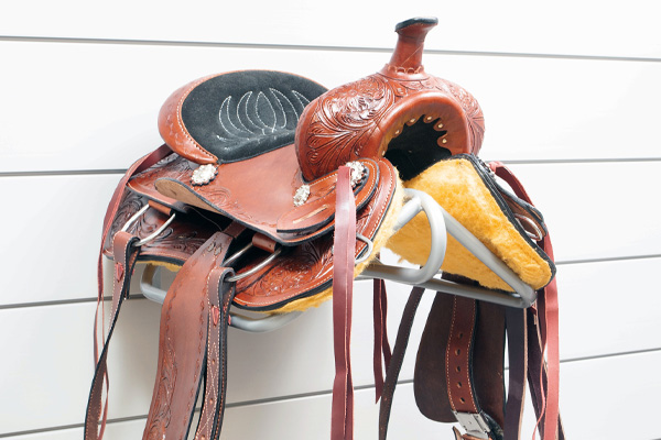 Saddle Hook. SADDLEHK. The CrownWall® Saddle hook is perfect for storing and organizing saddles by keeping them off the ground, and allowing them to properly dry after use. The center bar can also be used to hang blankets and other items.